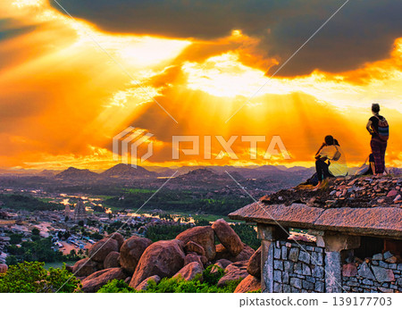Beautiful evening view of Hampi ruins from Matanga Hill Beautiful evening view of Hampi ruins from Matanga Hill 139177703