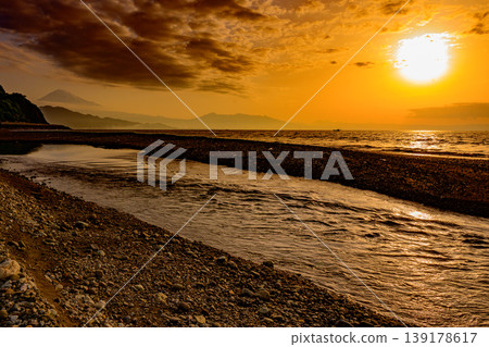The sea at sunrise, the river flowing into it, and Mount Fuji - Mt. Fuji sunrise river coast 139178617