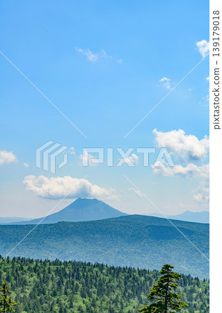 Lake Kussharo and the surrounding mountains as seen from Tsubetsu Pass in Hokkaido Lake Kussharo and the surrounding mountains as seen from Tsubetsu Pass in Hokkaido 139179018