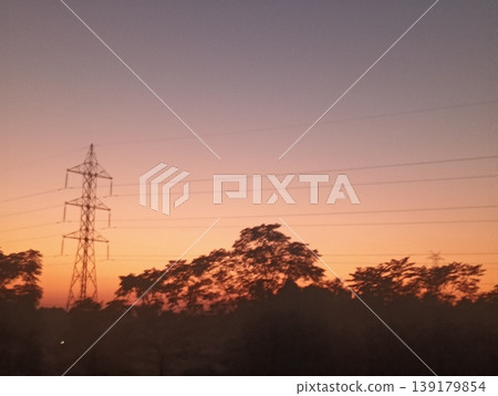 high voltage pole at sunset high voltage pole at sunset 139179854