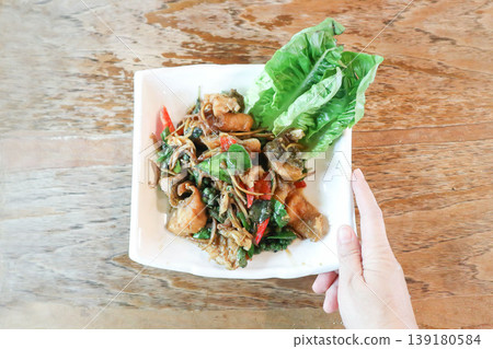 stir fried fish , stir fried bass or stir fried Sea bass fish with pepper and Chinese key or lesser ginger or spicy fish stir fried fish , stir fried bass or stir fried Sea bass fish with pepper and Chinese key or lesser ginger or spicy fish 139180584