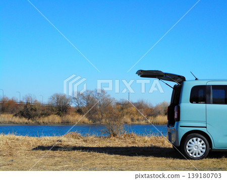 A minicar with its back door open 139180703