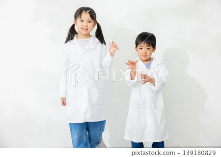 Child holding a test tube Child holding a test tube 139180829