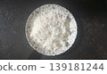 Fluffy Cooked White Rice on Patterned Ceramic Plate 139181244
