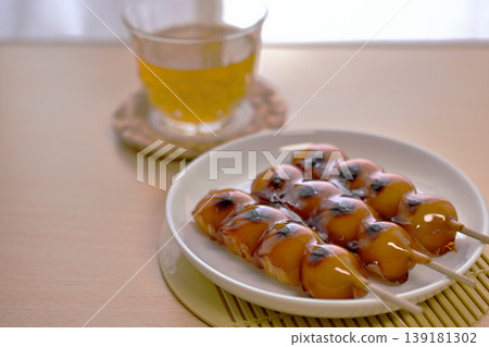 Mitarashi dango, a classic Japanese sweet. Mitarashi dango, a classic Japanese sweet. 139181302