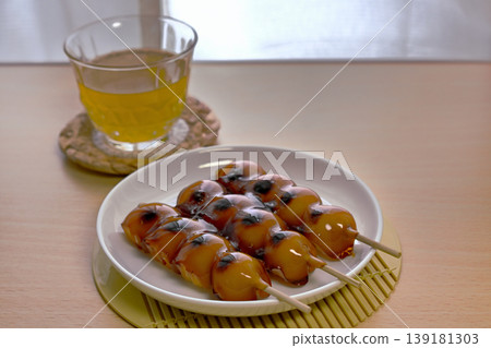 Mitarashi dango, a classic Japanese sweet. Mitarashi dango, a classic Japanese sweet. 139181303