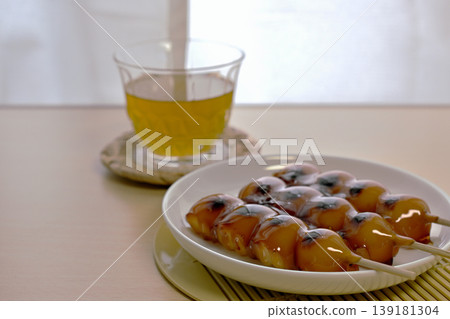 Mitarashi dango, a classic Japanese sweet. Mitarashi dango, a classic Japanese sweet. 139181304