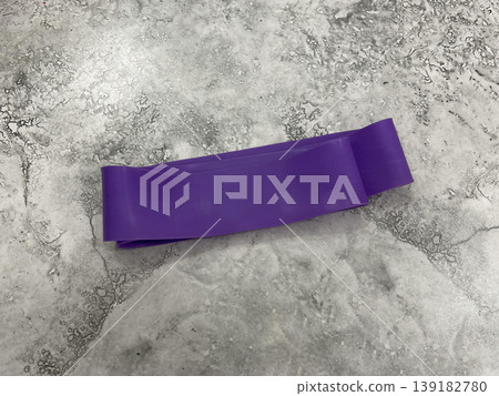 elastic resistance band on the floor in gym 139182780