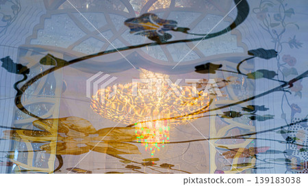 Abu Dhabi, United Arab Emirates - Jan 10 2024, View of giant chandelier inlaid with Swarovski crystals in reflection on marble floor the Grand Mosque of Sheikh Zayed Abu Dhabi, United Arab Emirates Abu Dhabi, United Arab Emirates - Jan 10 2024, View of giant chandelier inlaid with Swarovski crystals in reflection on marble floor the Grand Mosque of Sheikh Zayed Abu Dhabi, United Arab Emirates 139183038
