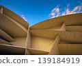 Doha, Qatar - Jan 06 2024, a panoramic view of National Museum of Qatar facade, exterior, shaped like a desert rose, at evening with blue sky, Doha, Qatar  139184919