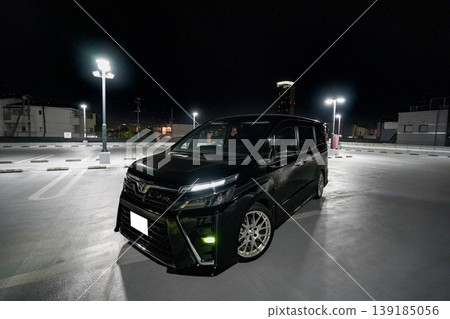 car parked in parking lot at night 139185056