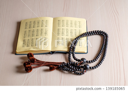 Prayer beads and sutra book Prayer beads and sutra book 139185065