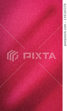 A dramatic abstract background featuring a sweeping light effect contrasting deep crimson red and bold magenta hues. Enhanced with a fashionable grainy noise texture A dramatic abstract background featuring a sweeping light effect contrasting deep crimson red and bold magenta hues. Enhanced with a fashionable grainy noise texture 139185379