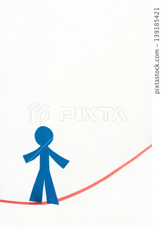 Balancing Act A Paper Cutout on a Tightrope Balancing Act A Paper Cutout on a Tightrope 139185421