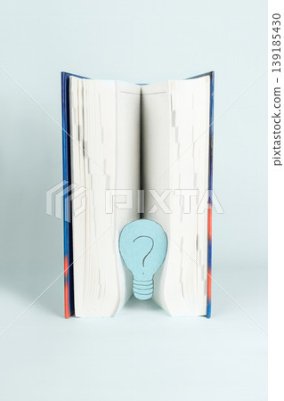 Book with a Lightbulbshaped Question Mark Idea and Knowledge Concept 139185430
