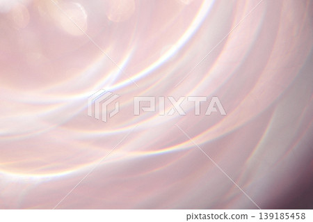 Abstract close-up of soft pastel swirls with light reflections creating a dreamy, ethereal background suitable for artistic or design applications Abstract close-up of soft pastel swirls with light reflections creating a dreamy, ethereal background suitable for artistic or design applications 139185458