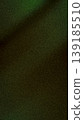 Dark forest green and olive abstract background with a heavy grainy texture and deep shadows, perfect for vertical nature-themed wallpapers, banners, and designs 139185510