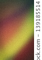 Vibrant abstract grainy background featuring a warm gradient of red, orange, yellow, and purple hues with a soft blurred texture for banners and wallpapers 139185514