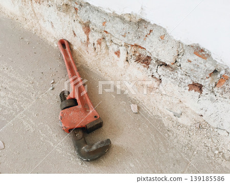 pipe wrench in construction site 139185586