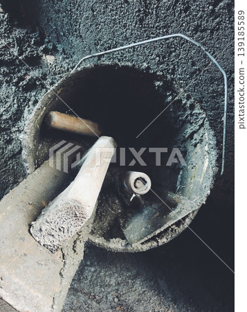 trowel in construction site	 139185589