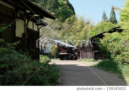 Traditional old houses with hanging lanterns stand amidst the old townscapes of the Nakasendo and Kiso Road, and in the lush green mountain villages. Traditional old houses with hanging lanterns stand amidst the old townscapes of the Nakasendo and Kiso Road, and in the lush green mountain villages. 139185652