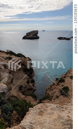Seascape at the rocky coast of Comino island Seascape at the rocky coast of Comino island 139185653