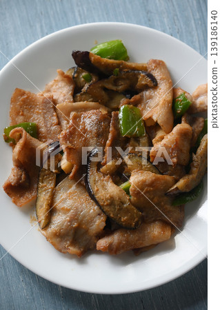 Stir-fried eggplant, green pepper and pork with miso Stir-fried eggplant, green pepper and pork with miso 139186140