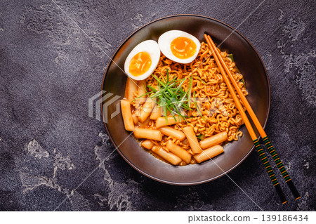 Spicy Rapokki - Korean tteokbokki rice cake and ramen noodle. Spicy Rapokki - Korean tteokbokki rice cake and ramen noodle. 139186434
