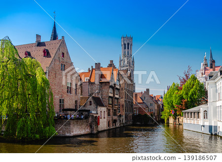 Beautiful canal and traditional houses in the old town of Bruges Beautiful canal and traditional houses in the old town of Bruges 139186507