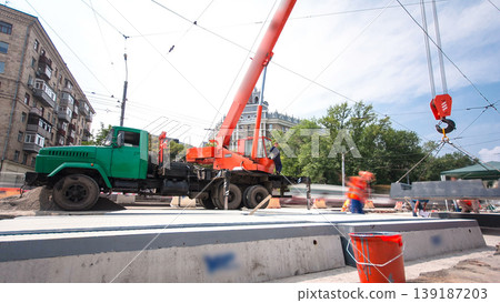 Road construction site with tram tracks repair and maintenance timelapse hyperlapse. Road construction site with tram tracks repair and maintenance timelapse hyperlapse. 139187203