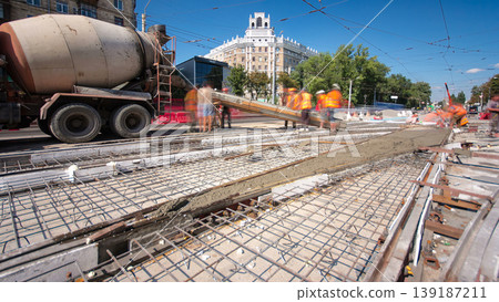 Road construction site with tram tracks repair and maintenance timelapse hyperlapse. Road construction site with tram tracks repair and maintenance timelapse hyperlapse. 139187211