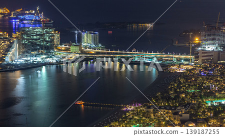 Aerial view of Palm Jumeirah Island night timelapse. Aerial view of Palm Jumeirah Island night timelapse. 139187255