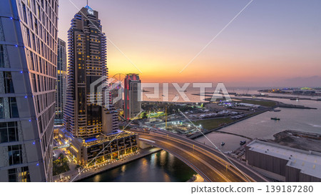 JBR and Dubai marina after sunset aerial day to night timelapse 139187280