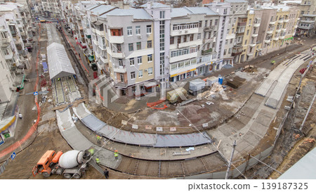 Concrete works for road maintenance construction site with many workers and mixer timelapse 139187325