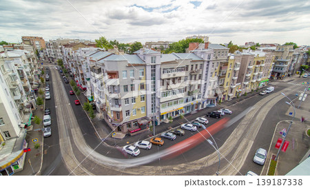 Traffic on intersection of Trinkler and Mayakovsky street near Sumskoy market, Kharkov city timelapse Traffic on intersection of Trinkler and Mayakovsky street near Sumskoy market, Kharkov city timelapse 139187338