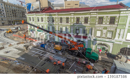 Concrete works for road construction with many workers and mixer timelapse Concrete works for road construction with many workers and mixer timelapse 139187386