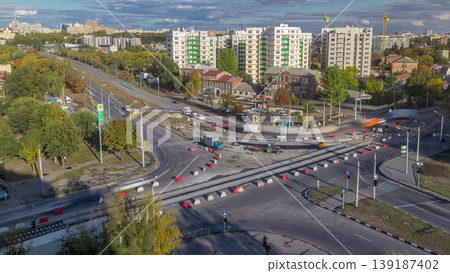 Aerial view of a large city intersection with road construction site urban works timelapse. Aerial view of a large city intersection with road construction site urban works timelapse. 139187402