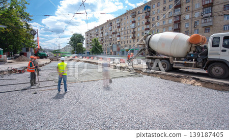 Road construction site with tram tracks repair and maintenance timelapse. Road construction site with tram tracks repair and maintenance timelapse. 139187405