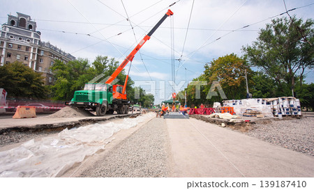 Road construction site with tram tracks repair and maintenance timelapse hyperlapse. Road construction site with tram tracks repair and maintenance timelapse hyperlapse. 139187410