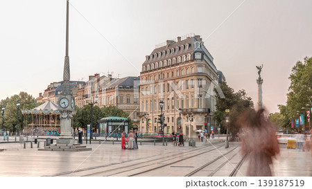 Triangular building and modern tram at Place de la Comedie timelapse, Bordeaux, France Triangular building and modern tram at Place de la Comedie timelapse, Bordeaux, France 139187519