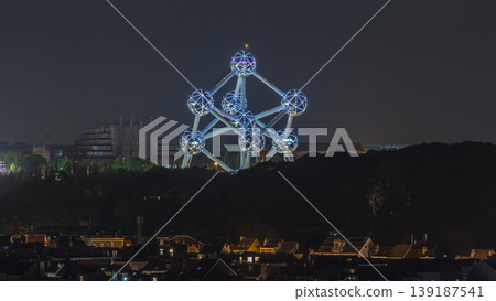 Aerial view of night city skyline timelapse with the Atomium in Brussels, Belgium. Aerial view of night city skyline timelapse with the Atomium in Brussels, Belgium. 139187541