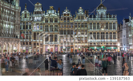 Illuminated Grand Place Guilds facade day to night timelapse in Brussels, Belgium. 139187563
