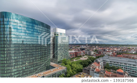 Aerial timelapse of Brussels urban landscape blending office skyscrapers with residential areas. Aerial timelapse of Brussels urban landscape blending office skyscrapers with residential areas. 139187566