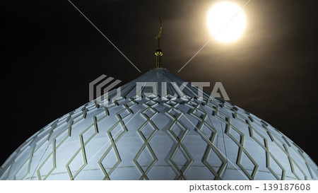 Dome of The Hazrat Sultan Mosque in Astana timelapse at night with full moon, Kazakhstan Dome of The Hazrat Sultan Mosque in Astana timelapse at night with full moon, Kazakhstan 139187608