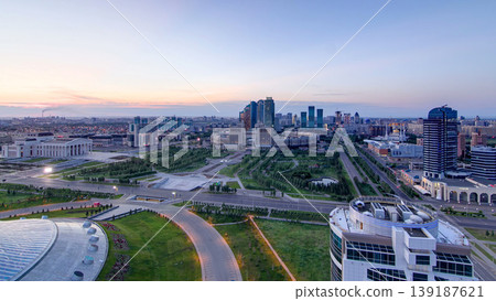 Aerial view over the city center and central business district night to day timelapse, Kazakhstan, Astana Aerial view over the city center and central business district night to day timelapse, Kazakhstan, Astana 139187621