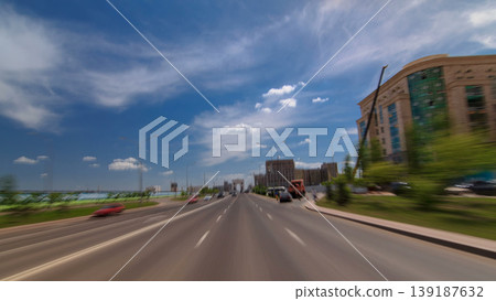 Car drives on street Traffic over the wide boulevards of Astana timelapse hyperlapse drivelapse in Kazakhstan Car drives on street Traffic over the wide boulevards of Astana timelapse hyperlapse drivelapse in Kazakhstan 139187632