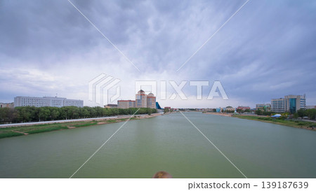 Modern houses on the riverside Ural in city Atyrau timelapse hyperlapse Modern houses on the riverside Ural in city Atyrau timelapse hyperlapse 139187639