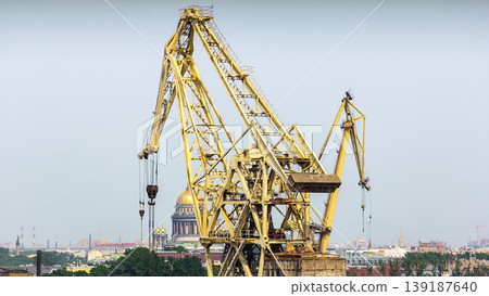 Working yellow cranes at shipyard aerial timelapse Working yellow cranes at shipyard aerial timelapse 139187640