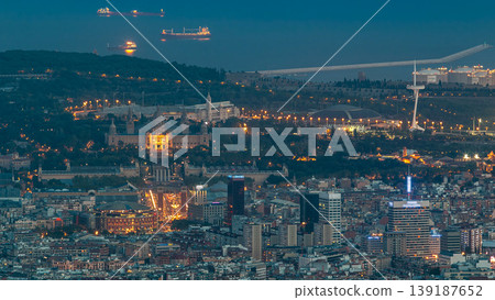 Top view from tibidabo of National Art Museum timelapse at Placa Espanya in Barcelona day to night, Catalonia, Spain 139187652