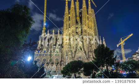 Sagrada Familia, a large church in Barcelona, Spain day to night timelapse. Sagrada Familia, a large church in Barcelona, Spain day to night timelapse. 139187656